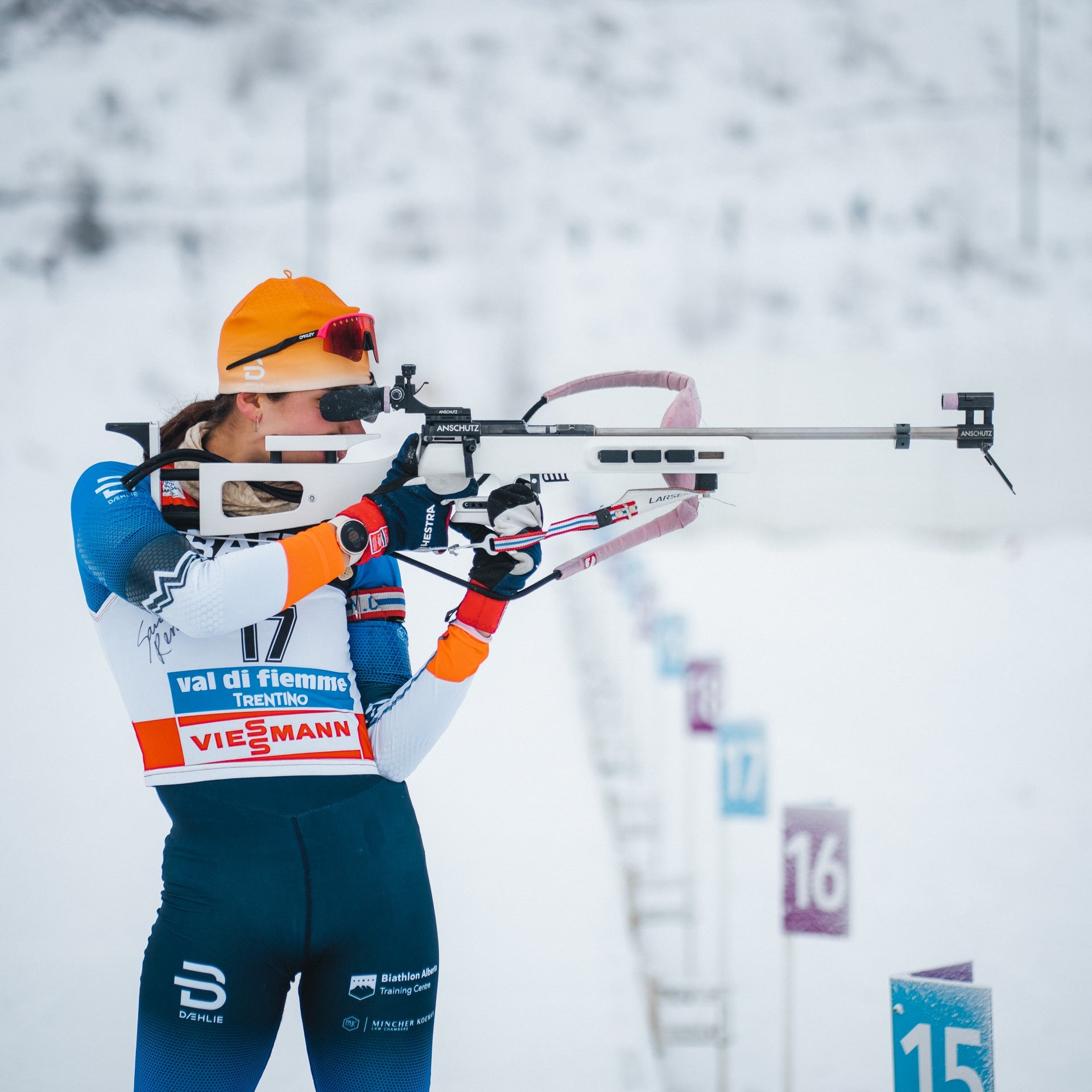Biathlete using the Naylor 1 Biathlon Stock in white with Anschutz 1827F Fortner rifle attached
