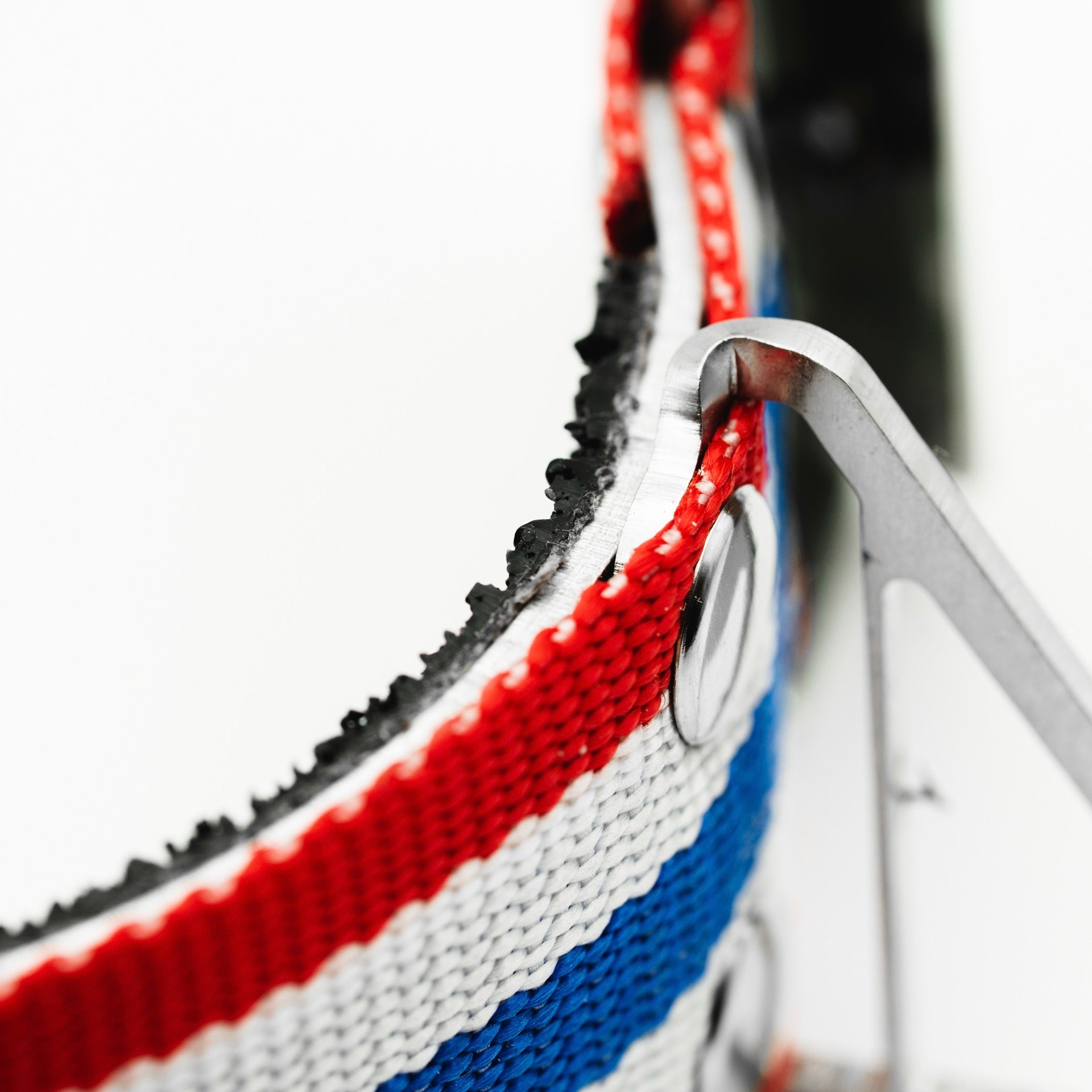 Closeup of aluminum band in a Larsen Biathlon Norway Arm Cuff 