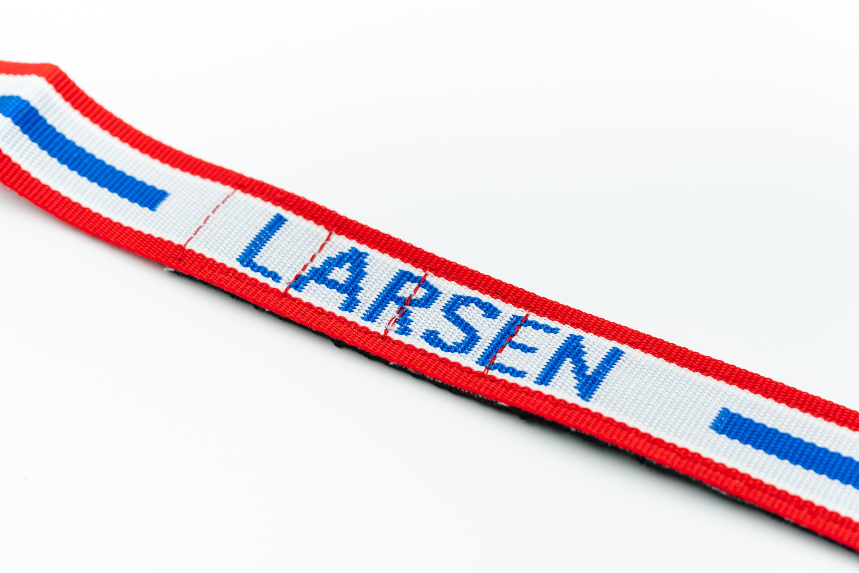 Close up of Larsen pirate arm cuff nylon strap material and removable stitching 