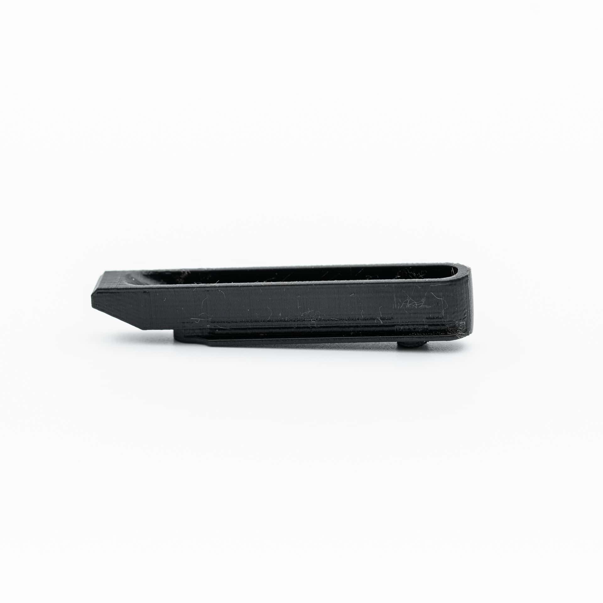 Naylor black plastic breech wedge for Anschutz 1827F Fortner biathlon rifle, full view