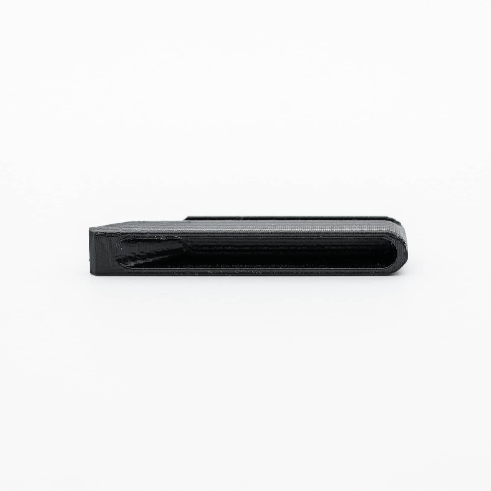 Naylor black plastic breech wedge for Anschutz 1827F biathlon rifles, side view