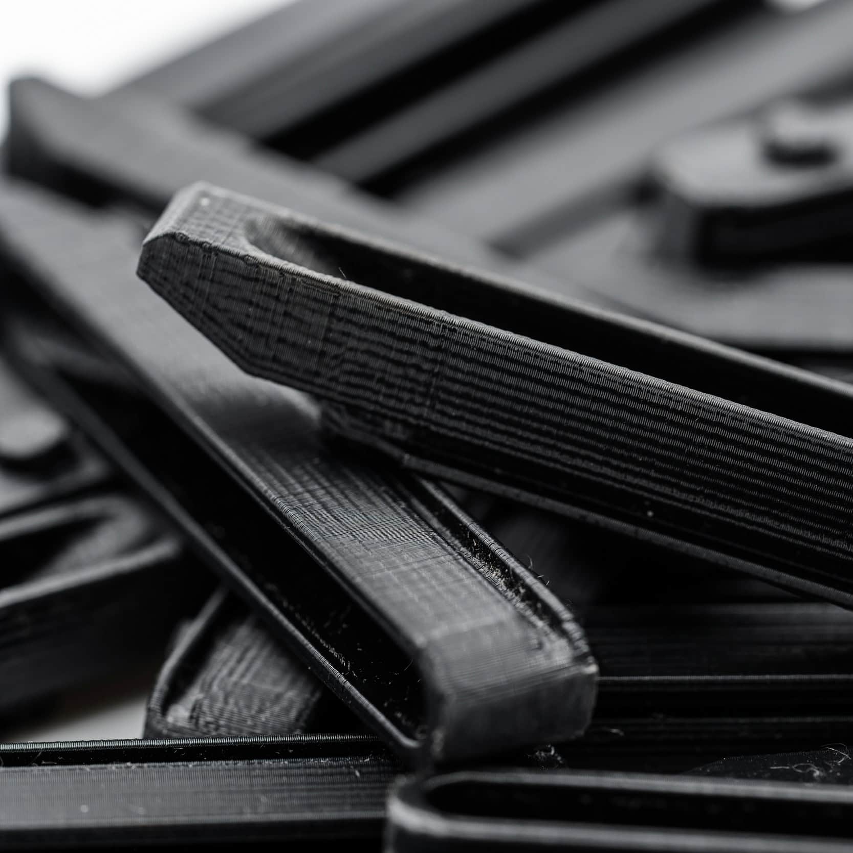 Naylor black plastic breech wedge for Anschutz 1827F biathlon rifles, close up view